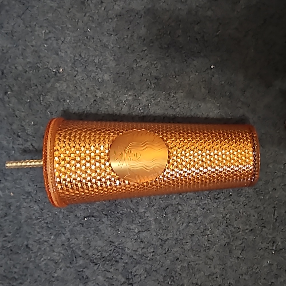 Used rose gold Starbucks tumbler